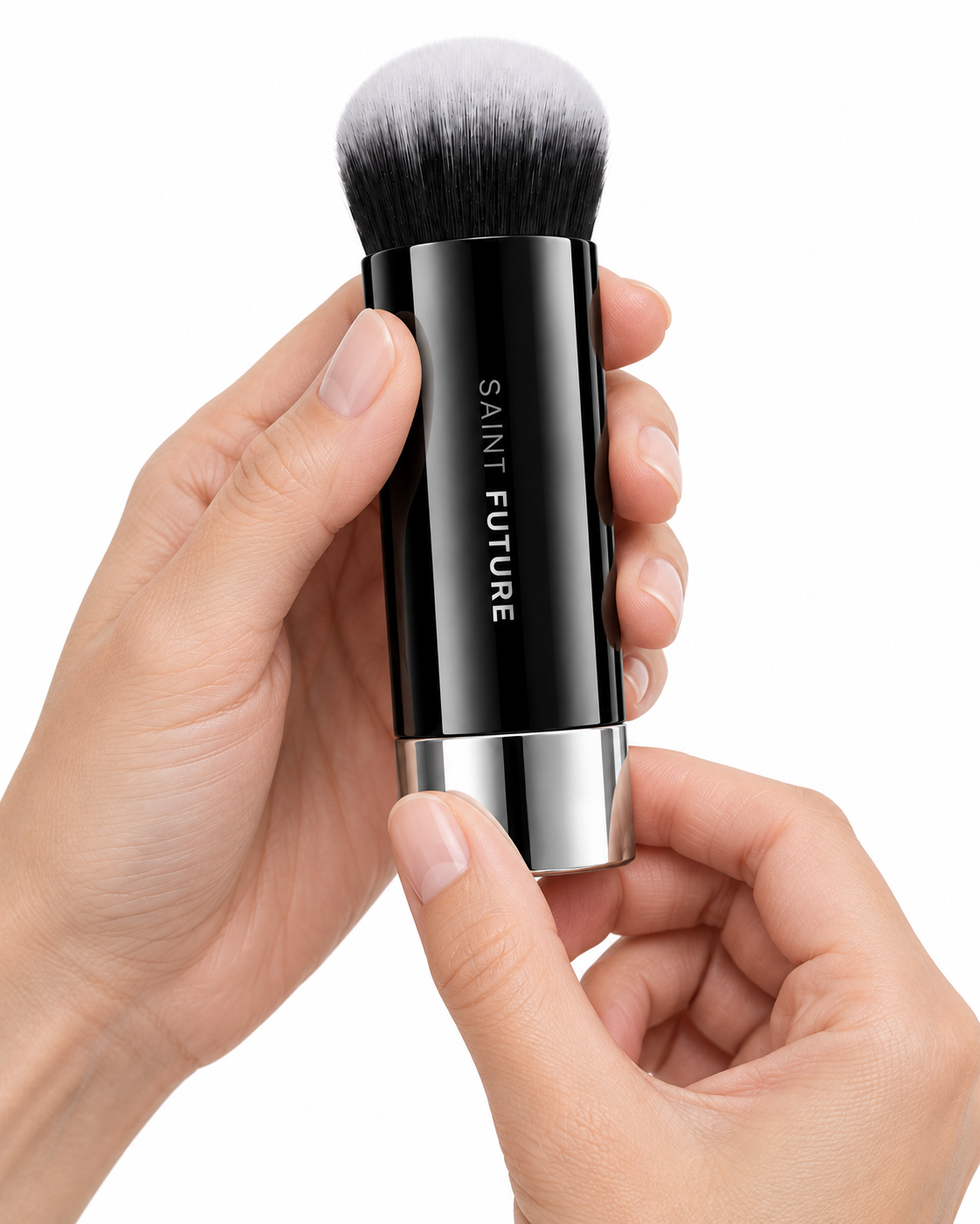 Saint Future F101 foundation brush standing on white, with a dense dual-tone kabuki head and chrome base